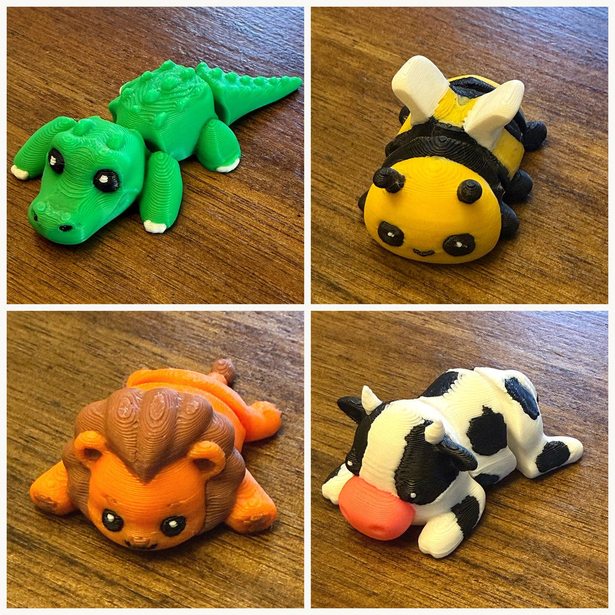 Four assorted 3D printed Mini Flexi Animals from Grey Duck Labs: alligator, bumblebee, lion, and cow